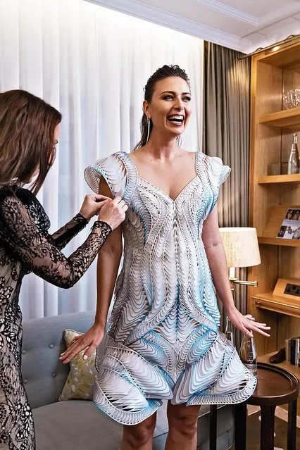 Russian former world No. 1 tennis player Maria Sharapova getting ready for an event in London wearing a couture Iris van Herpen dress made from recycled evian bottles on November 29, 2021 in London, England. (Photo by Tim P. Whitby/Getty Images for Evian)