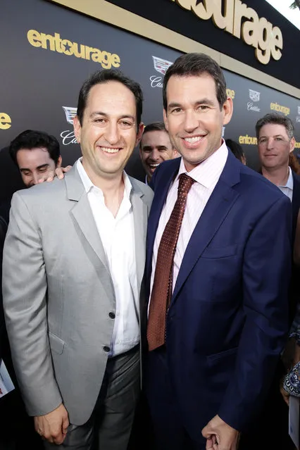 Greg Silverman, President of Creative Development and Worldwide Production and Writer/Director/Producer Doug Ellin at Warner Bros. Pictures and seen at Warner Bros. Premiere of "Entourage" held at Regency Village Theatre on Monday, June 1, 2015, in Westwood, Calif. (Photo by Eric Charbonneau/Invision for Warner Bros./AP Images)