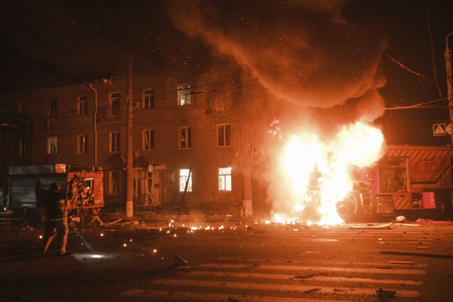 Firefighter's vehicle is seen on fire after Russian drone strikes on residential neighborhood in Kharkiv, Ukraine, on Thursday, April. 4, 2024. (Photo by George Ivanchenko/AP Photo)