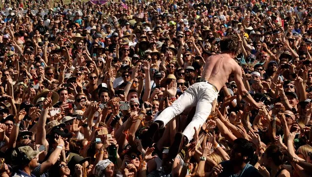 Singer Matt Shultz of Cage the Elephant crowd surfs during their performance. (Photo by Kevin Winter/Getty Images for Coachella)