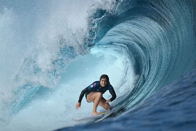 US surfer Caroline Marks competes during the Shiseido Tahiti pro in Teahupo'o, on the French Polynesian Island of Tahiti on May 25, 2024. Teahupo'o will host the surfing event of the Paris 2024 Olympic Games. (Photo by Jerome Brouillet/AFP Photo)
