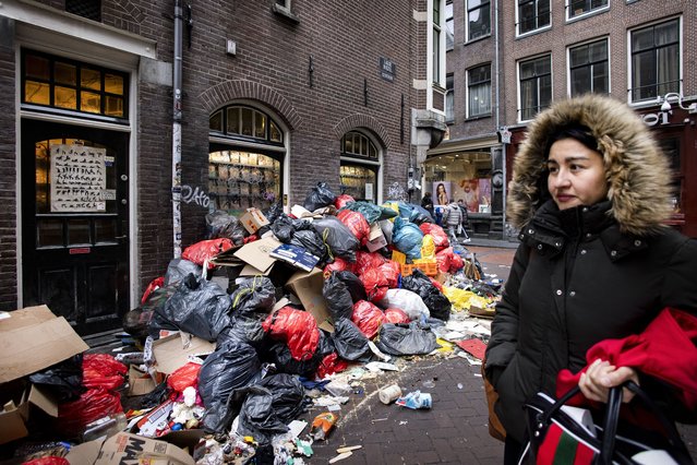 Bin bags pile up during a strike by rubbish collectors who are demanding better pay in Amsterdam, Netherlands on February 22, 2023. For example, mountains with garbage bags can be seen on, for example, the Oudezijds Voorburgwal and the Zeedijk and in the Damstraat and Jodenbreestraat. (Photo by Hollandse Hoogte/Rex Features/Shutterstock)