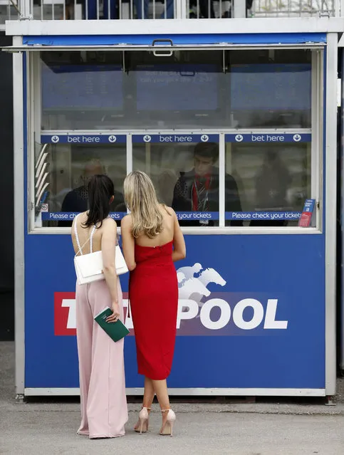 Racegoers during the Grand National Festival at Aintree Racecourse on April 6, 2017 in Liverpool, England. (Photo by Andrew Boyers/Reuters/Livepic)