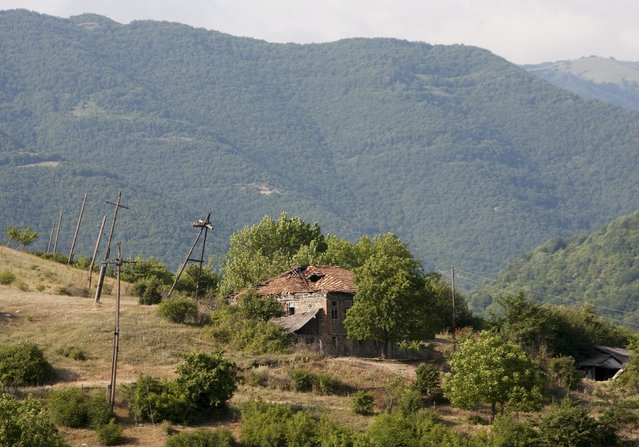 An abandoned house is seen in a remote settlement of the breakaway region of South Ossetia, Georgia, July 6, 2015. (Photo by Kazbek Basaev/Reuters)