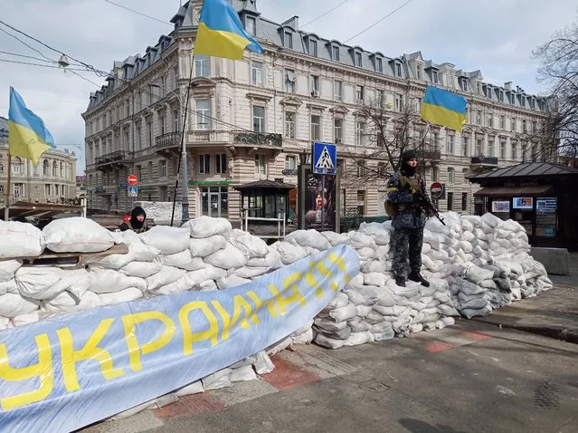 A barricade made of sandbags is seen in central Odessa, Ukraine, March 8, 2022. (Photo by Iryna Nazarchuk/Reuters)