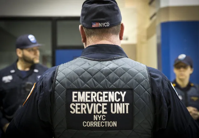Corrections officers work in the Enhanced Supervision Housing Unit at the Rikers Island Correctional facility in New York March 12, 2015. (Photo by Brendan McDermid/Reuters)