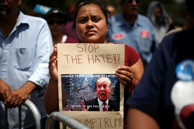 Supporter Maria Antonio waits for U.S. Democratic presidential candidate Bernie Sanders to speak in East Los Angeles, California, U.S. May 23, 2016. (Photo by Lucy Nicholson/Reuters)