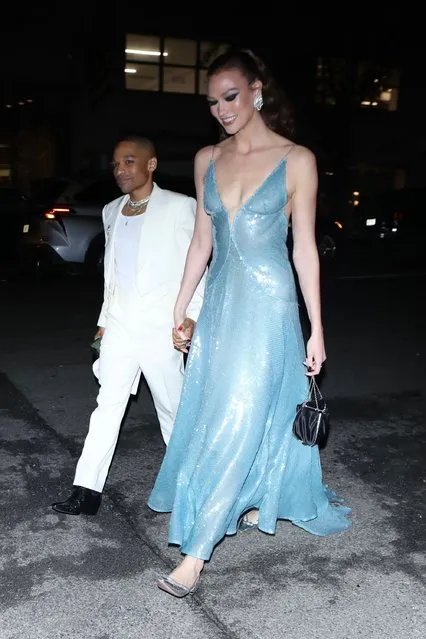 Model Karlie Kloss and a friend are seen attending a Met Gala Afterparty in New York on May 3, 2022. (Photo by Backgrid USA)
