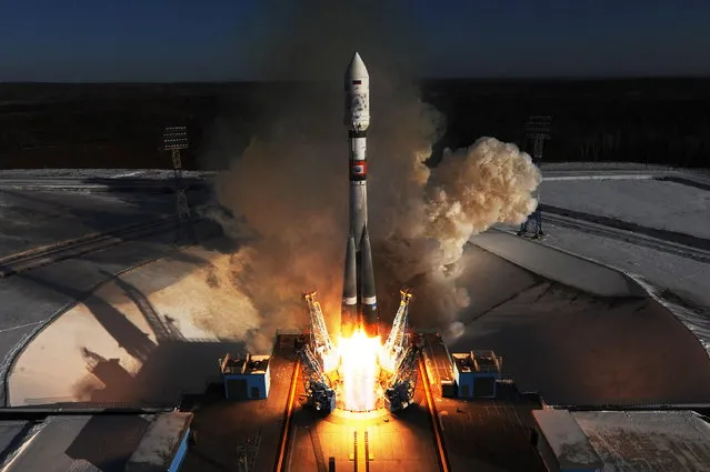 A Soyuz 2.1a rocket booster with a Frigate upper stage block launched from the Vostochny Cosmodrome, Amur Region, Russia on February 1, 2018. The Soyuz 2.1.a rocket booster is to deliver Russian Kanopus-V No3 and No4 remote sensing satellites and 9 small satellites to orbit. (Photo by Donat Sorokin/TASS)