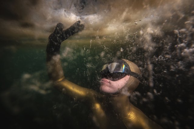 United Nations Development Program (UNDP) Turkiye's “Defender of Life in Water” World Free Diving Record Holder Sahika Ercumen dives into the depths of Marmara Sea with a single breath for mucilage (sea saliva), which has become more visible in recent years, in Balikesir, Turkiye on May 24, 2025. Mucilage in the Marmara Sea is driven by a combination of rising sea surface temperatures, the discharge of untreated waste into the water, and the sea's unique semi-enclosed structure that limits water circulation. Following the major outbreak in 2021, monitoring and cleanup efforts have continued, with experts reporting partial improvements despite periodic increases in mucilage levels. (Photo by Sebnem Coskun/Anadolu via Getty Images)