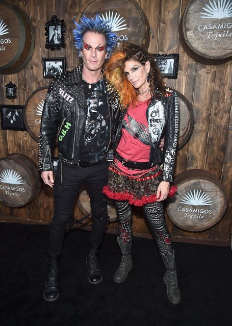 Model Cindy Crawford (R) and Casamigos co-founder Rande Gerber arrive to the Casamigos Halloween Party at a private residence on October 28, 2016 in Beverly Hills, California. (Photo by Alberto E. Rodriguez/Getty Images for Casamigos Tequila)