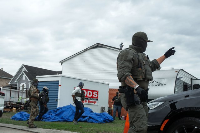 Federal agents leave after making detentions at a worksite during a large-scale immigration enforcement dubbed “Catahoula Crunch” in Metairie, Louisiana, USA, 03 December 2025. About 250 federal Border Patrol agents are deployed to New Orleans and surrounding areas as part of Trump administration ongoing crackdown on undocumented immigration. (Photo by Olga Fedorova/EPA)