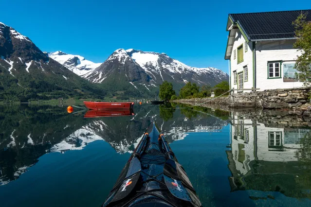 Hjelle Hotel , Oppstrynvatnet lake in Stryn, Norway. (Photo by Thomasz Furmanek/Caters News Agency)