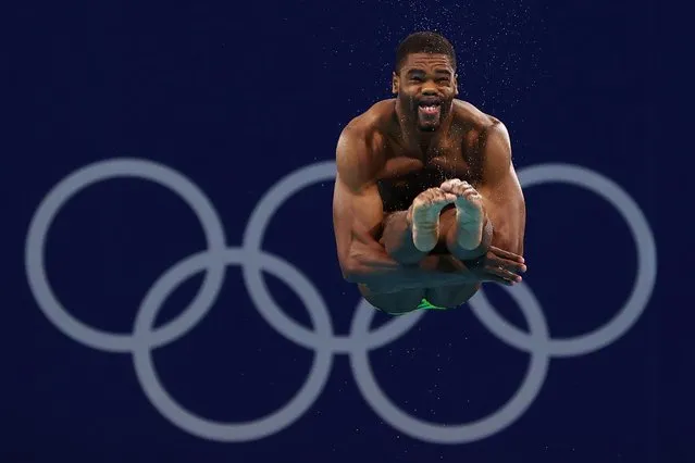 Jamaica's Yona Knight-Wisdom competes in the men's 3m springboard diving semi-final event during the Tokyo 2020 Olympic Games at the Tokyo Aquatics Centre in Tokyo on August 3, 2021. (Photo by Antonio Bronic/Reuters)