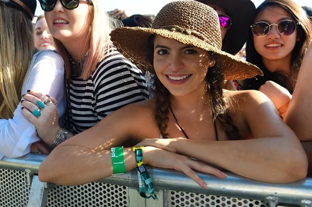 A concert goer poses for a photo at the 2015 Coachella Music and Arts Festival on Saturday, April 11, 2015, in Indio, Calif. (Photo by Scott Roth/Invision/AP Photo)