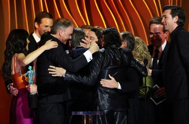 The cast of Succession celebrate after winning the award for Best Outstanding Performance by an Ensemble in a Drama Series during the 30th Screen Actors Guild Awards, in Los Angeles, California on February 25, 2024. (Photo by Mario Anzuoni/Reuters)