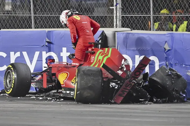 Monaco's Formula One driver Charles Leclerc of Scuderia Ferrari Mission Winnow gets out of his damaged car after a crash during the second practice session for the 2021 Formula One Grand Prix of Saudi Arabia at the Jeddah Corniche Circuit in Jeddah, Saudi Arabia, 03 December 2021. The inaugural Formula One Grand Prix of Saudi Arabia will take place on 05 December 2021. (Photo by EPA/EFE/Stringer)
