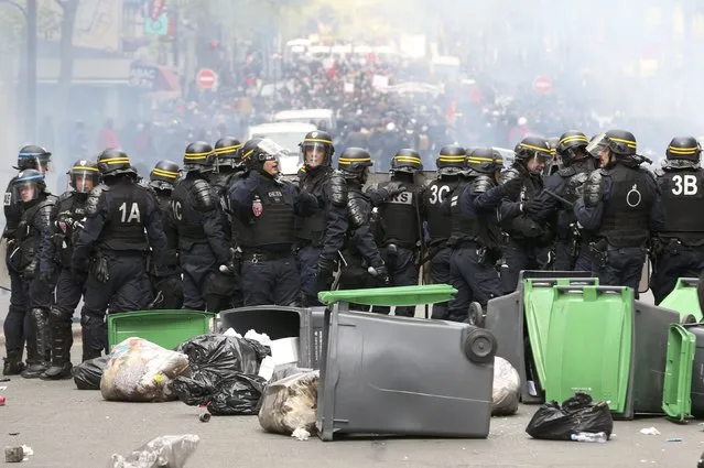 French CRS riot police face off with French labour union workers and students during a demonstration against the French labour law proposal in Paris, France, as part of a nationwide labor reform protests and strikes, April 28, 2016. (Photo by Charles Platiau/Reuters)
