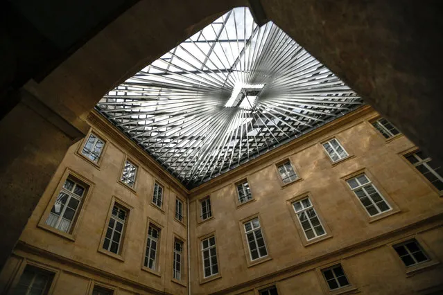 A photograph taken on May 5, 2021 shows the renovated glass celing of the 18th Century Hotel de la Marine building, in Paris. The Hotel de la Marine was built between 1757 and 1774, and is located on place de la Concorde. After hosting the French Naval staff until 2015, the building is managed by the Centre des Monuments Nationaux and was currently used as a space for temporary exhibitions and auctions until its planned refurbishment. (Photo by Stephane de Sakutin/AFP Photo)