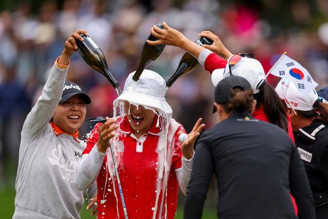 Amy Yang of South Korea is doused with champagne after winning the KPMG Women's PGA Championship at Sahalee Country Club on June 23, 2024 in Sammamish, Washington. (Photo by Ezra Shaw/Getty Images)