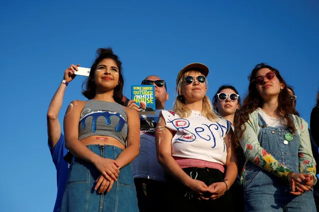 Supporters wait for U.S. Democratic presidential candidate Bernie Sanders to speak in Santa Monica, California, U.S., May 23, 2016. (Photo by Lucy Nicholson/Reuters)