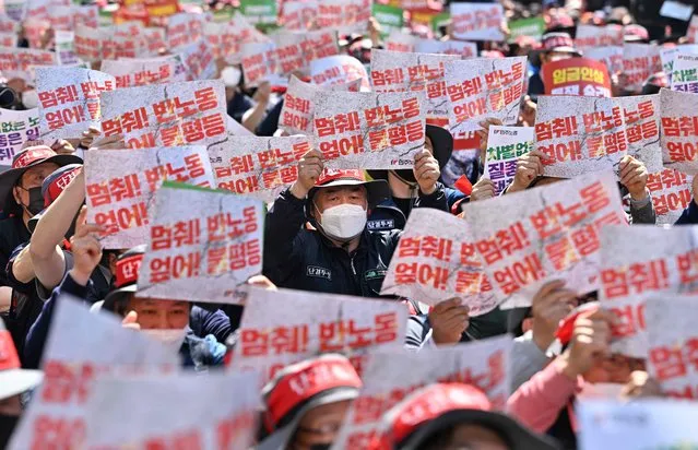Members of the Korean Confederation of Trade Unions stage a May Day rally calling for improved working conditions and rights, in central Seoul on May 1, 2022. (Photo by Jung Yeon-je/AFP Photo)