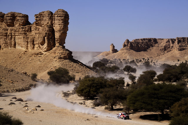 Toyota's driver Giniel De Villiers of South Africa and his co-driver Alex Bravo Haro of Spain compete during the Stage 9 of the Dakar 2020 between Wadi Al Dawasir and Haradh, Saudi Arabia, on January 14, 2020. (Photo by Franck Fife/AFP Photo)