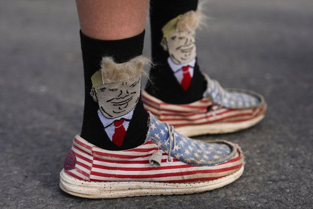 An person wears Donald Trump-themed socks before a campaign rally for Republican presidential nominee former President Donald Trump at Riverfront Sports, Wednesday, October 9, 2024, in Scranton, Pa. (Photo by Julia Demaree Nikhinson/AP Photo)