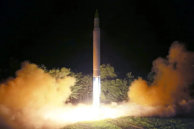 Intercontinental ballistic missile (ICBM) Hwasong-14 is pictured during its second test-fire in this undated picture provided by KCNA in Pyongyang on July 29, 2017. (Photo by Reuters/KCNA)