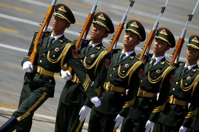 Soldiers of China's People's Liberation Army (PLA) march at the beginning of the military parade marking the 70th anniversary of the end of World War Two, in Beijing, China, September 3, 2015. (Photo by Damir Sagolj/Reuters)