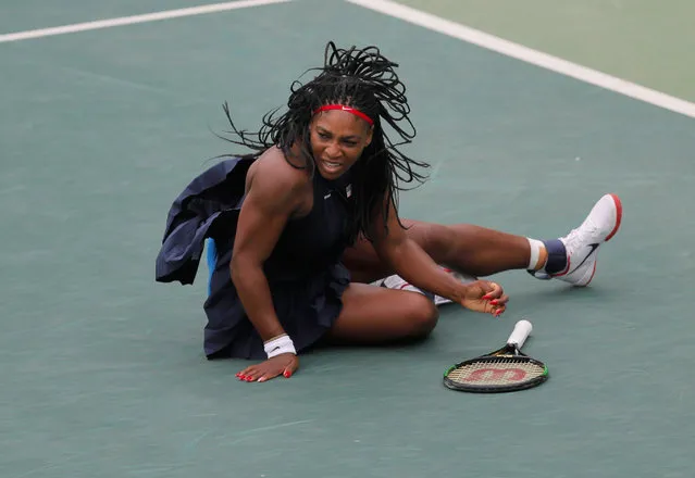 Serena Williams of the United States falls during the match against Australia's Daria Gavrilova in the women's tennis competition at the 2016 Summer Olympics in Rio de Janeiro, Brazil, Sunday, August 7, 2016. (Photo by Vadim Ghirda/AP Photo)