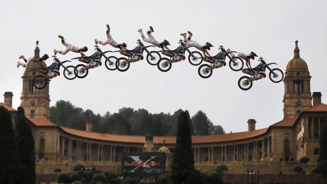 This multiple exposure image shows Japanese rider, Taka Higashino performing a trick during the Redbull X Fighters at the Union Buildings in Pretoria, South Africa, September 12, 2015. (Photo by Kim Ludbrook/EPA)