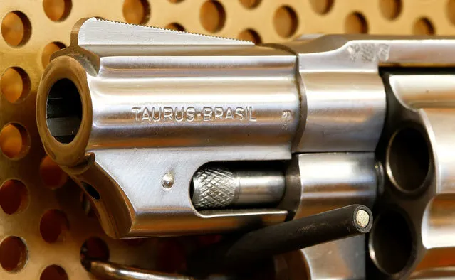 The muzzle of a Brazilian Taurus revolver is seen at Wyss Waffen gun shop in the town of Burgdorf, Switzerland August 10, 2016. Europeans in a number of countries are seeking to arm themselves with guns and self-defense devices in growing numbers following a series of attacks by militants and the mentally ill. Some weapons sellers also link their increased business to the arrival of huge numbers of migrants in Europe, although a German police report stated that the vast majority do not commit crimes of any kind in the country. (Photo by Arnd Wiegmann/Reuters)