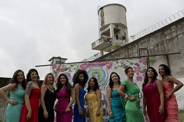 Female inmates pose in evening gowns during their jail's annual beauty contest at the Talavera Bruce penitentiary in Rio de Janeiro, Brazil, early Thursday, November 23, 2017. Women serving time at a prison in Rio de Janeiro have swapped their uniforms for gowns to take part in the beauty pageant. (Photo by Silvia Izquierdo/AP Photo)