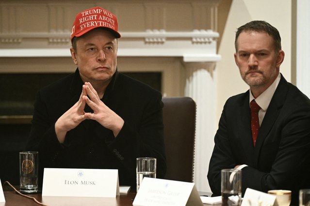 Elon Musk and US Trade Representative Jamieson Greer attend a cabinet meeting hosted by US President Donald Trump in the Cabinet Room of the White House on March 24, 2025, in Washington, DC. (Photo by Brendan Smialowski/AFP Photo)
