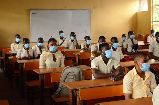 High School female students wears a face mask while they reads in a classroom at Ireti Junior Grammar Schol, Ikoyi, Lagos on August 3, 2020 on the first day after resumption of classes after the COVID-19 coronavirus lockdown. (Photo by Olukayode Jaiyeola/NurPhoto via Getty Images)