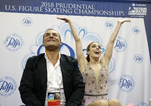 Ashley Wagner, right, reacts to her scores next to coach Rafael Arutunian during the women's free skate event at the U.S. Figure Skating Championships in San Jose, Calif., Friday, January 5, 2018. (Photo by Tony Avelar/AP Photo)