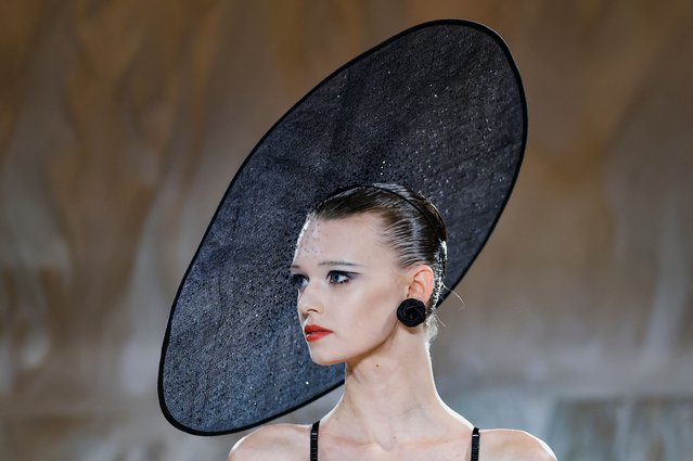 A model presents a creation by designer Giorgio Armani as part of his Haute Couture Fall/Winter 2025-2026 collection show for fashion house Giorgio Armani Prive, in Paris, France, on July 8, 2025. (Photo by Manon Cruz/Reuters)