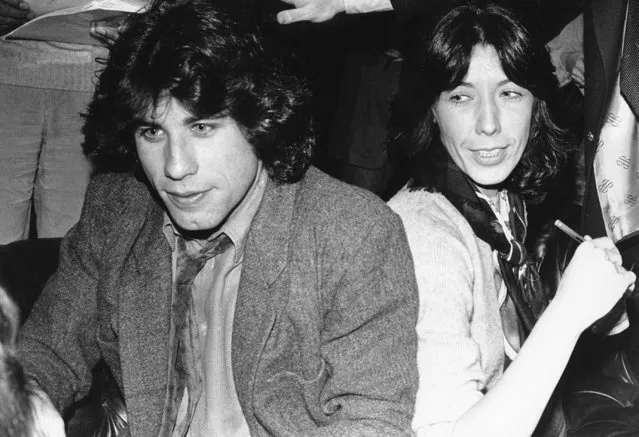 John Travolta, left, and Lily Tomlin are seen at a news conference to discuss their new movie “Moment by Moment” in Chicago, Ill., on December 12, 1978. (Photo by AP Photo)