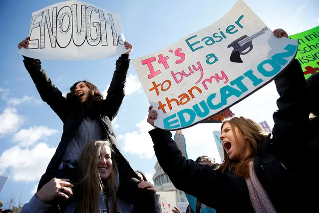 Students from Washington, DC-area schools protest for stricter gun control during a walkout by students at the U.S. Capitol in Washington, U.S., March 14, 2018. (Photo by Joshua Roberts/Reuters)