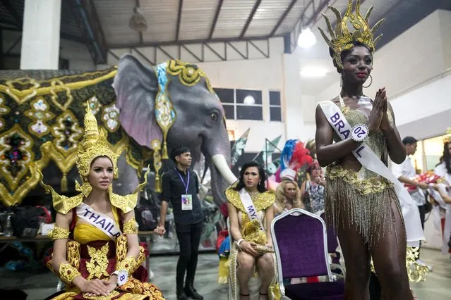 Contestants prepare to go on stage during the Miss International Queen 2015 transgender/transsexual beauty pageant in Pattaya, Thailand, November 6, 2015. (Photo by Athit Perawongmetha/Reuters)