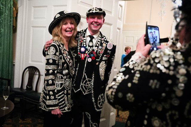 Dame Susan Langley, Lady Mayor of London, poses for a picture with a member of the Pearly Society during a ceremony at The Mansion House to be crowned the 'Pearly Queen Lady Mayor of The City of London' by the Pearly society on November 26, 2025 in London, England. Dame Susan Langley, who recently became the first ever 'Lady Mayor of the City of London', is 'crowned' as the first ever 'Pearly Mayor of the City of London' in a specially commissioned Pearly outfit given to her by the Pearly Society. (Photo by Alishia Abodunde/Getty Images)