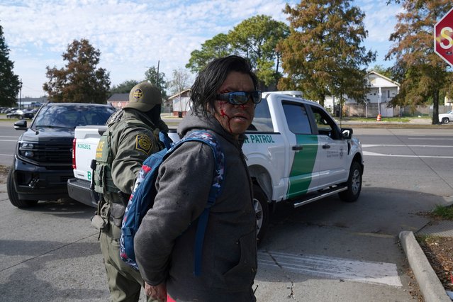 Border Patrol agents detain a man on the street on December 3, 2025 in New Orleans, Louisiana. This comes on the first day of the operation in Louisiana, “Catahoula Crunch”, launched by the Department of Homeland Security as a part of the immigration enforcement surge on undocumented immigrants in the United States. (Photo by Ryan Murphy/Getty Images)