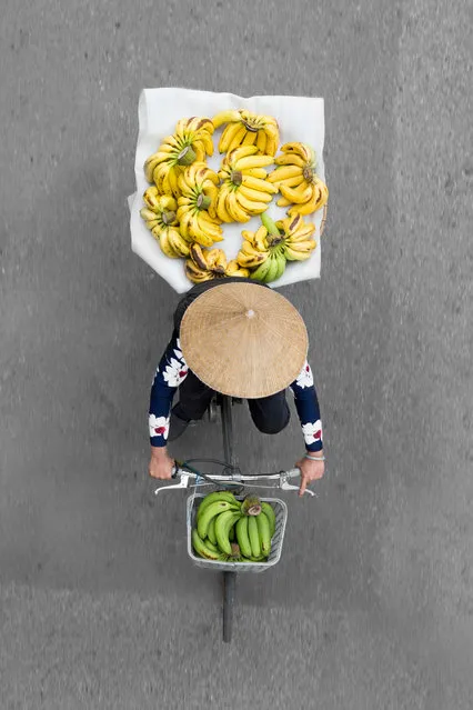 “This woman is in her late 70s. She still moves around the city selling fruit. She can’t carry the weight on her bicycle, so after collecting the fruit from the market in the morning she drops most of it at a friend’s place. She goes back multiple times during the day to restock”. (Photo by Loes Heerink/The Guardian)