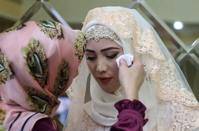 The bride during a traditional Chechen wedding ceremony in Grozny, Chechnya, Russia on November 24, 2016. (Photo by Valery Sharifulin/TASS)