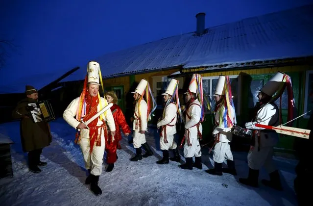 Belarussian villagers perform during a celebration of the "Tsary" rite in the village of Semezhevo, Belarus January 13, 2016. (Photo by Vasily Fedosenko/Reuters)