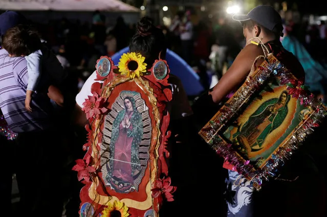 Pilgrims carry images of the Virgin of Guadalupe at the Basilica of Guadalupe during the annual pilgrimage in honor of the Virgin of Guadalupe, patron saint of Mexican Catholics, in Mexico City, Mexico December 11, 2016. (Photo by Henry Romero/Reuters)