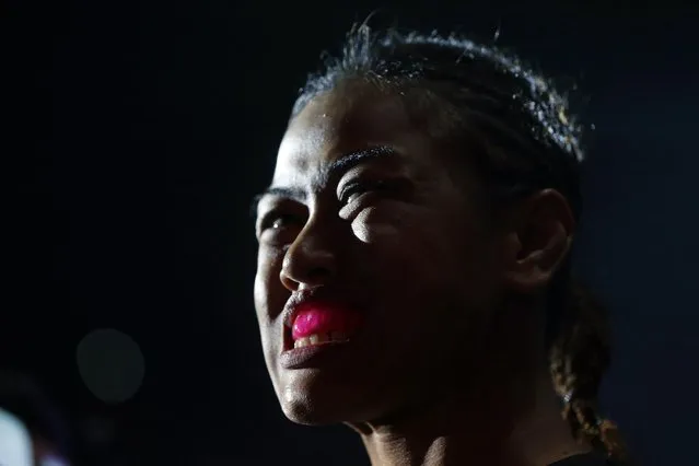 Malaysia's Ann Osman puts in her mouth guard before her mixed martial arts (MMA) ONE Championship fight against Egypt's Walaa Abbas in Kuala Lumpur, March 13, 2015. Osman is the first female Muslim MMA fighter to compete at the top level of the sport. (Photo by Olivia Harris/Reuters)