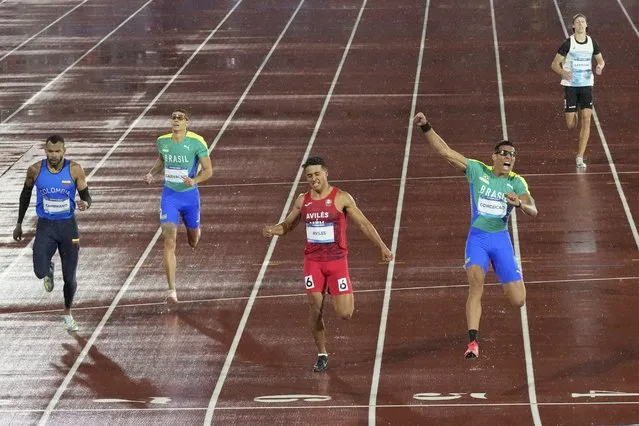 Brazil's Lucas Conceicao celebrates winning the gold medal in the men's 400-meters final at the Pan American Games in Santiago, Chile, Wednesday, November 1, 2023. Mexico's Luis Aviles won the silver medal and Colombia's Anthony Jose Zambrano won the bronze medal. (Photo by Fernando Vergara/AP Photo)