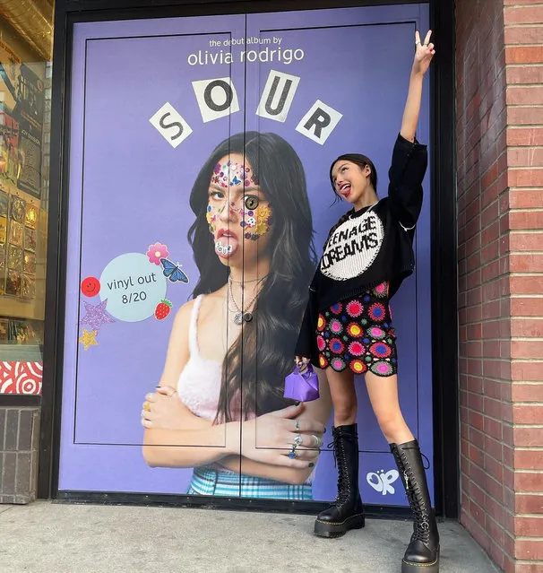 American singer-songwriter and actress Olivia Isabel Rodrigo poses outside of Amoeba music in Los Angeles, California at the end of August 2021, as her debut album, “Sour”, gets released on vinyl. (Photo by Instagram)